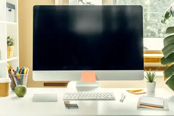 Desktop computer monitor on a modern home or office workspace